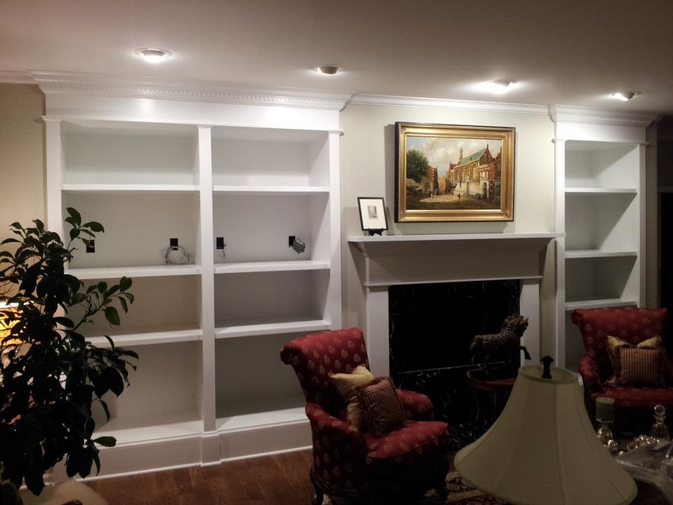 Built-in shelves, mantel, and trim work for home remodel.